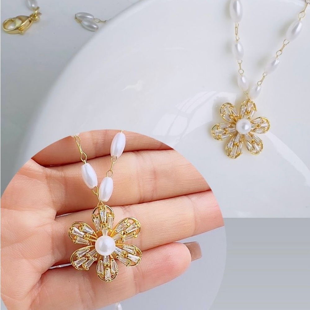 Gold Tone Rhodium Necklace and Earrings.